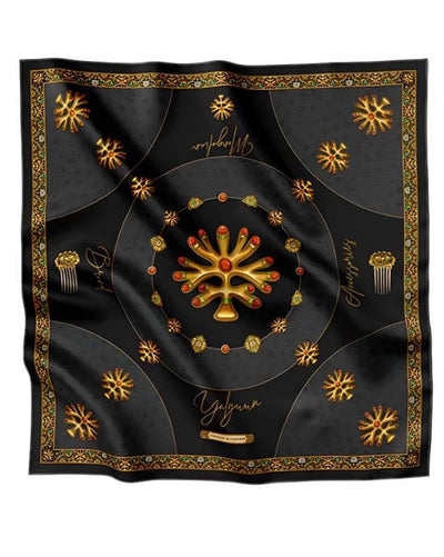 Luxurious black silk scarf adorned with golden traditional motifs, intricate ornaments, and decorative patterns, exuding elegance and sophistication.