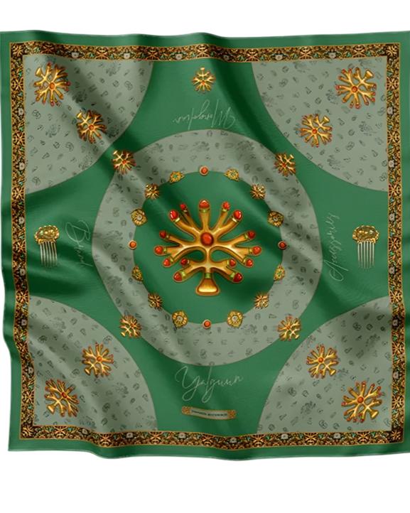 Luxurious green silk scarf adorned with golden traditional motifs, intricate ornaments, and decorative patterns, exuding elegance and sophistication.