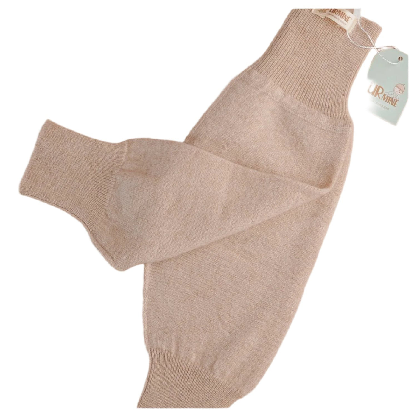 Soft beige baby cashmere pants featuring a ribbed waistband and ankle cuffs, designed for ultimate comfort and warmth.