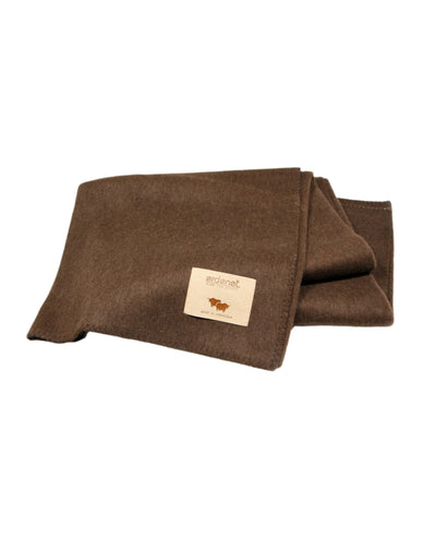Brown yak wool blanket with stitched edging, made in Mongolia, offering warmth, softness, and sustainability.